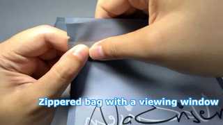 Tas met ritssluiting en kijkvenster